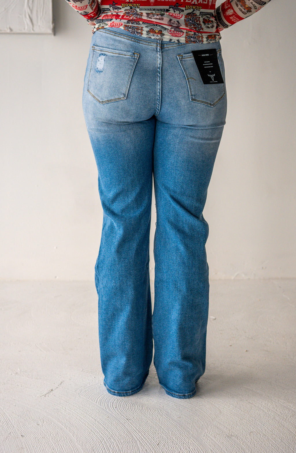 Light Wash High Rise Distressed Bootcut Jeans