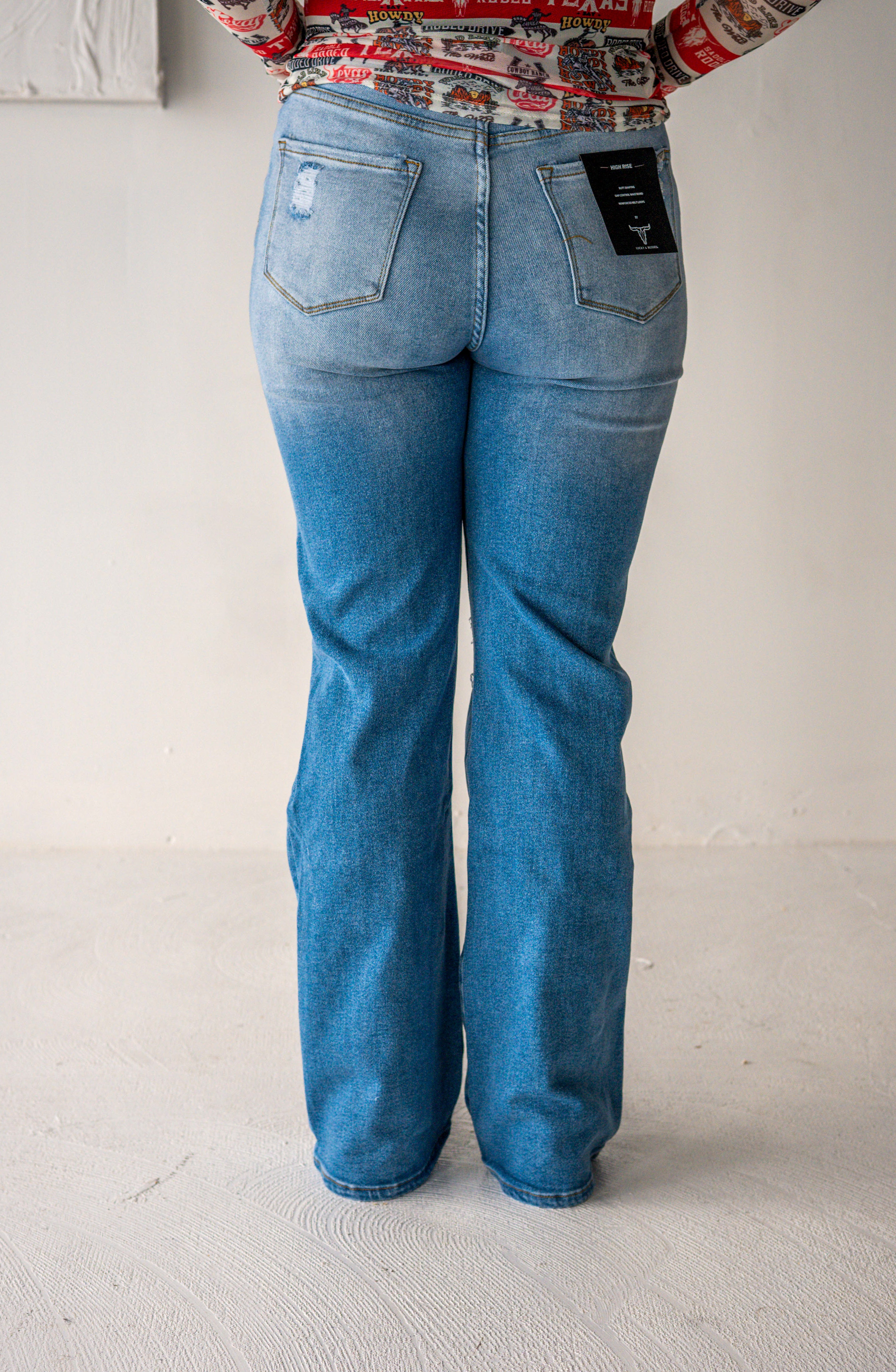 Light Wash High Rise Distressed Bootcut Jeans