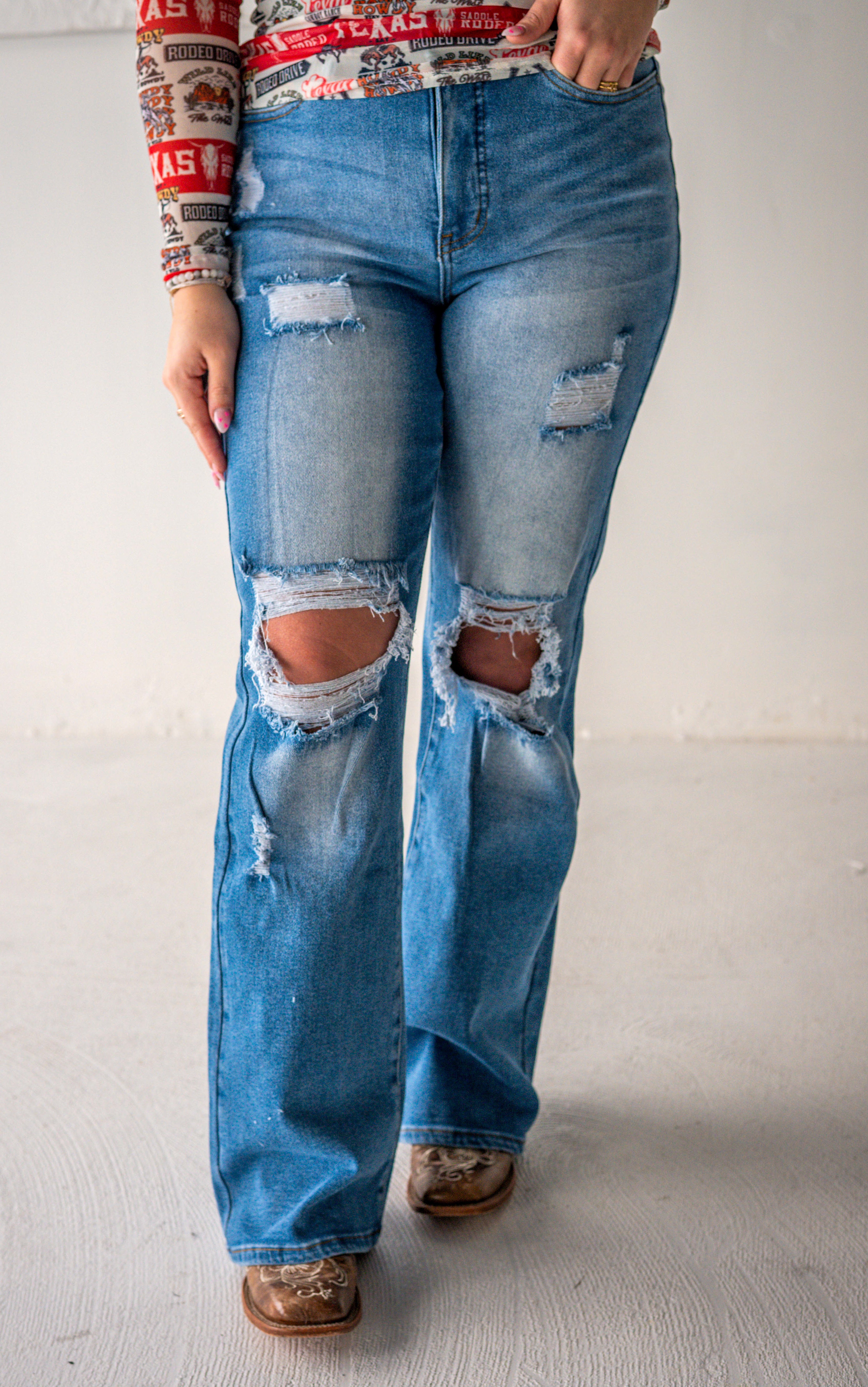 Light Wash High Rise Distressed Bootcut Jeans